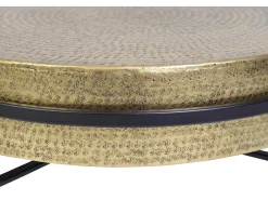 Base da mesa com placa de bronze e pés de metal preto.