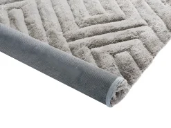 Conjunto mesa de centro tampo giratório transparente JOLINE e tapete felpudo cinzento MAZE