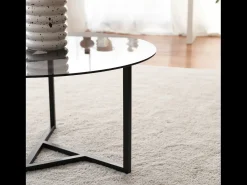 Mesa de centro redonda em vidro temperado Mia com pés em metal preto