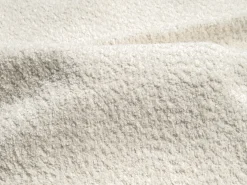 Sofá de canto esquerdo aberto em tecido bouclé branco POGNI de Maison Céphy