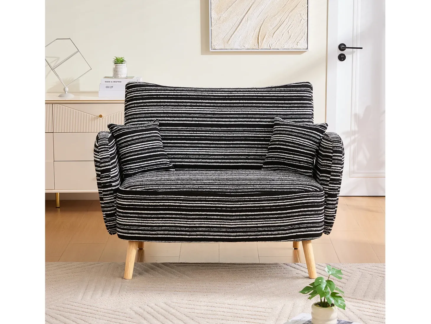 Sofá de dois lugares em tecido bouclé preto - Com bolsos laterais e duas almofadas.